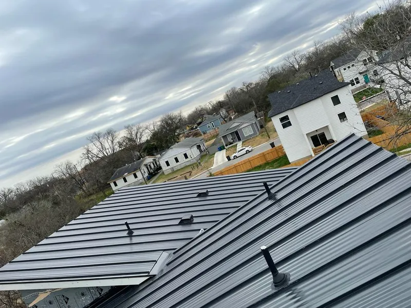 Standing seam metal roof panels with vents for Skylight Repair in Lisle